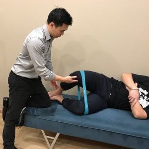 Chiropractor Singapore Shaun Ranen Ang with Patient